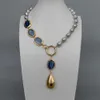 YﾷYING Naturelle d'eau Douce de Culture de Riz Gris Perle Ovale Bleu Kyanites Y Design Pendentif Collier 19"
