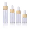 Clear Glass Essential Oil Bottle 5ml 10ml 15ml 20ml Perfume Sample Container with Plastic Wooden Grain Cover
