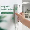 Plug bord vaste houder huishoudelijke zelfklevende wandmontage plastic opslag beugel punch-free router fix power cord plug board