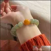 Braccialetti con ciondoli Bracciale gioielli Una corda a mano in giada naturale Coniglio di cartone animato Fetta di radice di loto Qingshui Yuanzhufu Marca Womens Single Woven Drop