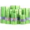 100ピースDOYPACKマットグリーンウィンドウジッパーロックアルミホイルバッグスタンドアップ再販可能なミートコーヒーパウダースナックナッツクリスマス結婚式ギフトヒートシール包装袋