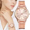 Luxury Pink Gold rostfritt stål klockor kvinnlig klassisk rund ratten kvarts titta på damer affärs armbandsur