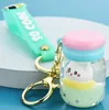 Плавучая кошка Macaron Quicksand Keychain Surfing Coat Draving Bottle Bottle Botter Автомобильная сумка для ключа Сумка для цепного кольца для девушки и женщин Подарочные украшения Аксессуары