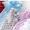 INS bébé filles évider chaussettes princesse printemps été 2021 style espagnol infantile enfants gros noeud net bas enfants longueur genou lâche bonneterie D029