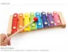 Vendita diretta in fabbrica bussare a mano Qin giocattolo per strumenti a percussione in legno a otto toni per bambini