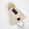 Designer Pom Pom Beanie Solid Color Brand Women Sport Ski Hats Autumn Winter Print Mönster Sticked Hat3749582