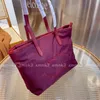 Designerhandväskor Unisex-väskor Mode Lyx Stor kapacitet Shoppingväska för kvinnor Storlek 35 cm 5 färger