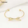 gold bow bangle