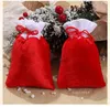 10 * 15 cm Buon Natale Sacchetto regalo rosso Tinta unita Sacco di Babbo Natale Borsa con coulisse Albero di Natale Sacchetti per imballaggio di caramelle T2I52879