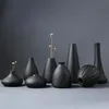 Sıcak Satış Yeni Modern Siyah Seramik Çiçek Düzenlemesi Küçük Vazo Ev Dekorasyon Küçük Vazo Masa Süsleme El Sanatları 210310
