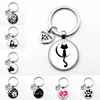 Amour chat empreintes d'animaux chiens verre Cabochon porte-clés sac voiture porte-clés porte-anneau breloques porte-clés pour hommes femmes cadeaux