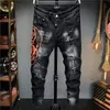 Europeisk stil Herrmodemärke Jean Herr Slimma jeansbyxor Svarta jeans Raka Moto Biker Hole Svarta byxor för män