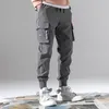 Calças de carga para homens moda vintage masculino hip hop preto cinza bolsos joggers homem moletom macacão plus size 5xl307m