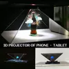 Skrivbordsbordsklockor 3D Hologram Pyramid Display Projektor Video Stand Universal Mini Durable Portable Projektorer för Smart Mobile Phone