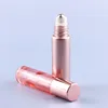 Conjunto de 4 frascos de rolo de vidro rosa rosa de 10 ml com espelho fosco essência/óleos básicos soro roll on bola massagem perfume refil cuidados com a pele