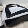 デザイナートートバッグラグジュアリーショルダーバッグファッションブランドシンプルなレトロな寛大なショッピング旅行バッグ大中およびキャンバス小文字のハンドバッグ