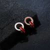 Small Studs Designer Jewelry Titanium Steel Colors Double Ring Roman Siffror Röda och vita diamantstudörhängen för kvinnor Simple5274975