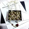 Collana da donna con ciondolo a forma di collana di perle a catena lunga profumata, pendente, collana con pendente a forma di fiore di lusso dorato per donna