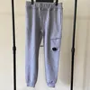 Pantaloni della tuta da jogging Pantaloni da uomo Topstoney Fashion Hip Hop Uomo da jogging Streetwear Sport Pantaloni da uomo casual in cotone sciolto a figura intera