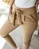 Estilo inglês feminino verão calças lápis de cor sólida bandagem design bolsos decoração cintura alta cintura fina quadris calças para streetwear x0629