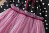 Set di abbigliamento abbigliamento per bambini autunno e inverno nuovo punto onda coreana 'vestito gonna a sbuffo patchwork per ragazze in rete