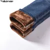 Band winter dikke fleece jeans voor vrouwen strekken warme mager denim fluwelen potlood vrouwelijk broek 210608