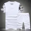 T-shirt e pantaloncini con stampa di modelli di uccelli squisiti in stile cinese, completi estivi da uomo in cotone di alta qualità, nuovi 267I