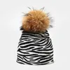 Mode tricoté bonnets chapeaux pour femmes Plaid léopard zèbre vache impression Bonnet hiver extérieur chaud réel fourrure de raton laveur pompon chapeau
