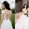 2022 Simple Tulle Beach Boho Wedding Dresses A Line Bridal Gowns Sheer Neck Cap Sleeve Appliques Pleats Long Bohemian Country Style 328 328