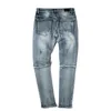 Jeans Uomo Jeans con buchi lavati in acqua barba di gatto fo