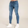 Jeans skinny elastici da uomo 2021 Pantaloni a matita stretch tinta unita Streetwear Jeans da uomo in denim nero blu Pantaloni da jogging da cowboy186V