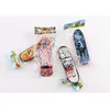 2021 Mini Fingerboard Finger Skateboard Toy, Boarding Movimento creativo della punta delle dita Bomboniere Novità Giocattoli per bambini