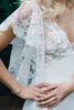 2021 Elegant 3d blomma vit bröllopsklänning En linje V Neck Lace Appliqued Golvlängd Brudklänningar Robe de Mariée