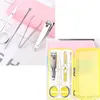 Rostfritt stål 4 st / set Hushållsundersökningar Nails Kit Manicure Saxar Set Portable Fingernail Trimmers Nail Tools Plastlåda uppsättningar XDH1390 T03