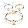 Tianro Haute Qualité En Acier Inoxydable Ouvert Bracelet Femme Trois Couleurs En Forme De Coeur Dames Bracelet Élastique