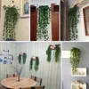 プラスチックシンダプサス人工アイビーフラワーガーランドブドウの偽のシンダプスズハンギング植物のための庭の装飾4PCS LOT9215571