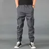 Pruimiua nieuwe winter mannen broek dikke fleece joggers multi pocket losse sport broek mannelijke casual warme joggingbroek lading pant y0927