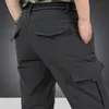 Erkek Kış Kalın Polar Sıcak Streç Kargo Pantolon Askeri Softshell Su Geçirmez Rahat Taktik Pantolon Artı Boyutu 4XL 210715