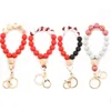 Brins de bois de silicium Perles Porte-clés Bracelet Poignet Porte-clés Motifs de festival de Noël Perlé Bracelet d'Halloween pour les femmes Accessoires de bijoux de vacances