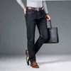 Shan Bao otoño primavera ajustado recto estiramiento denim jeans estilo clásico insignia juventud hombres negocios casual jeans pantalones 211120