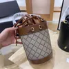 2021 Women Luxurys Designers Stuff Sacks Drawstring leather Shoulder Satchel clutch Bags Lady String Barrel-shaped Plain Handbags 301I