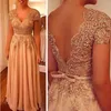 2021 Blush Pink Aftonklänningar för kvinnor som bär V Neck Cap Sleeves Lace Appliques Crystal Beaded Sashes Plus Size Prom Dress Party Gowns