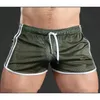 Men Shorts Casual Gym Fitness Training Shorts Sexy Mesh Breathable Sports Beach Trunks Male Clothing New Comfortable Y200901