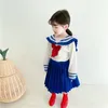 Primavera verano llegada niñas moda estilo azul marino conjuntos niños Top + falda trajes 210528