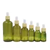 False Wood Plastic Lid Olive Green Glass Bottle Cosmetic Packaging Refillable Containers Empty Essential Oil Rubber Dropper Vials 5ml 10ml 15ml 20ml 30ml 50ml 100ml