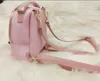 Meninas designer mochila moda senhora letra impresso ombros sacos clássico mulher pu casual saco kids acessórios presente f503