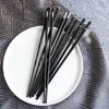 5 couples de baguettes à baguettes pointues couramment utilisées dans une utilisation à domicile et une boîte de Chopsticka454346428 du dîner noir de 243 mm