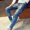 最高品質の2021ファッションリッピング穴の穴の穴の穴のある青いジーンズパンツ男性バギーハリムジーンズティーンエイジャーデニムカウボーイズズボンx0621