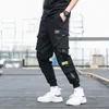 Мужские боковые карманы Cargo Harem брюки ленты черные хип-хоп повседневные мужские пробежки брюки мода уличная одежда 220315
