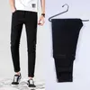 2021 Nouveaux Hommes Stretch Skinny Jeans Mode Casual Slim Fit Denim Pantalon Bleu Noir Blanc Ciel bleu Pantalon Mâle Marque Vêtements X0621270y